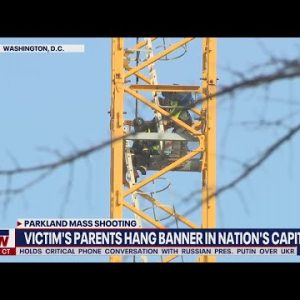 Parkland father climbs construction crane on anniversary of mass shooting