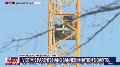 Parkland father climbs construction crane on anniversary of mass shooting