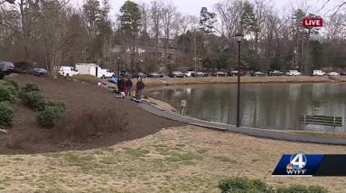 Dive team, investigators searching for evidence in pond at East North Street