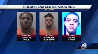 Two men charged, one wanted for attempted murder in mall shooting