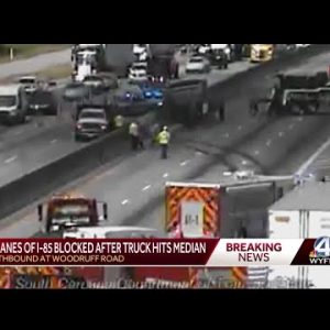 All lanes of I-85 blocked after truck hits median