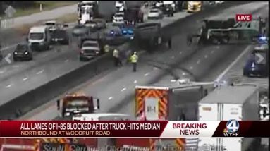 All lanes of I-85 blocked after truck hits median
