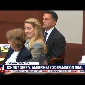 Amber Heard smirks as Johnny Depp lawyer calls her liar for Kate Moss push story
