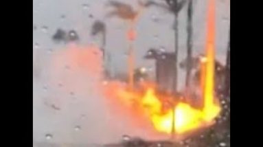 Video shows power lines on fire, flooding in Naples