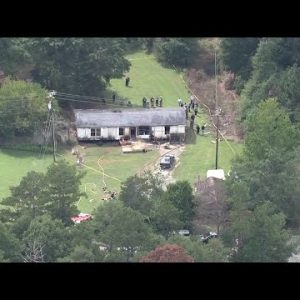 Woman, dog found dead in Anderson County house fire, coroner says