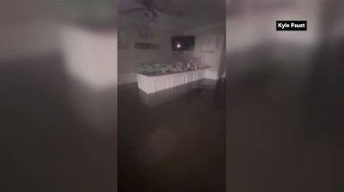 North Myrtle Beach homeowner wades through flooded home