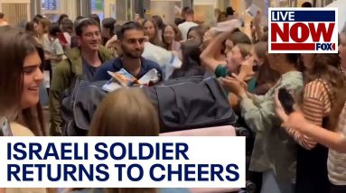 Israeli soldier returns to cheering crowd at Tel Aviv airport amid war with Hamas | LiveNOW from FOX