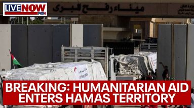 BREAKING: Aid trucks enter Gaza Strip, Israel allows border crossing to open | LiveNOW from FOX